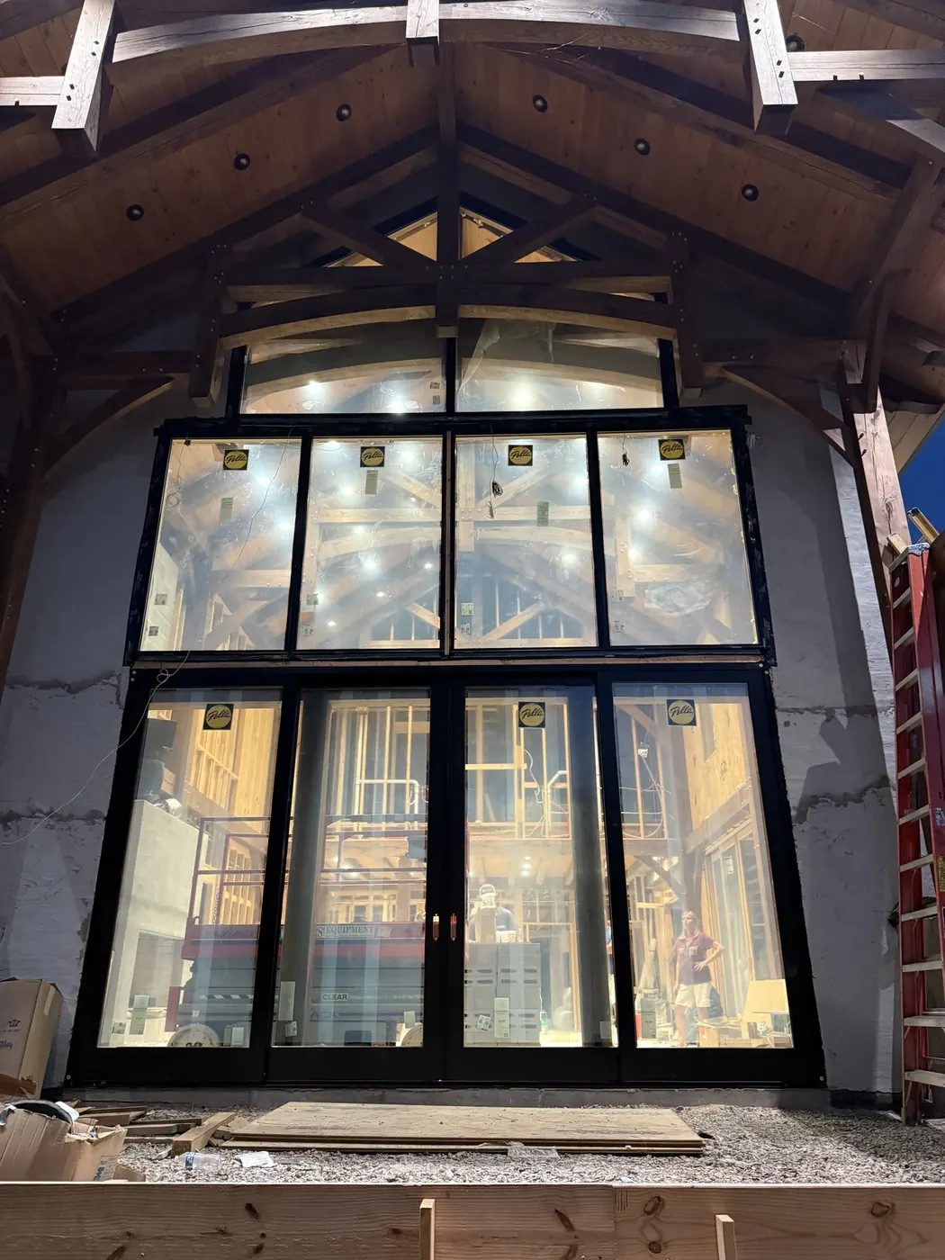 After: the glass package is set into the timber-framed opening.
